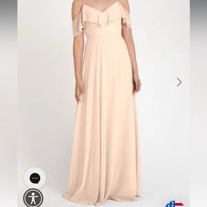 Wore for as a bridesmaid in best friends wedding. Dry cleaned, no stains.